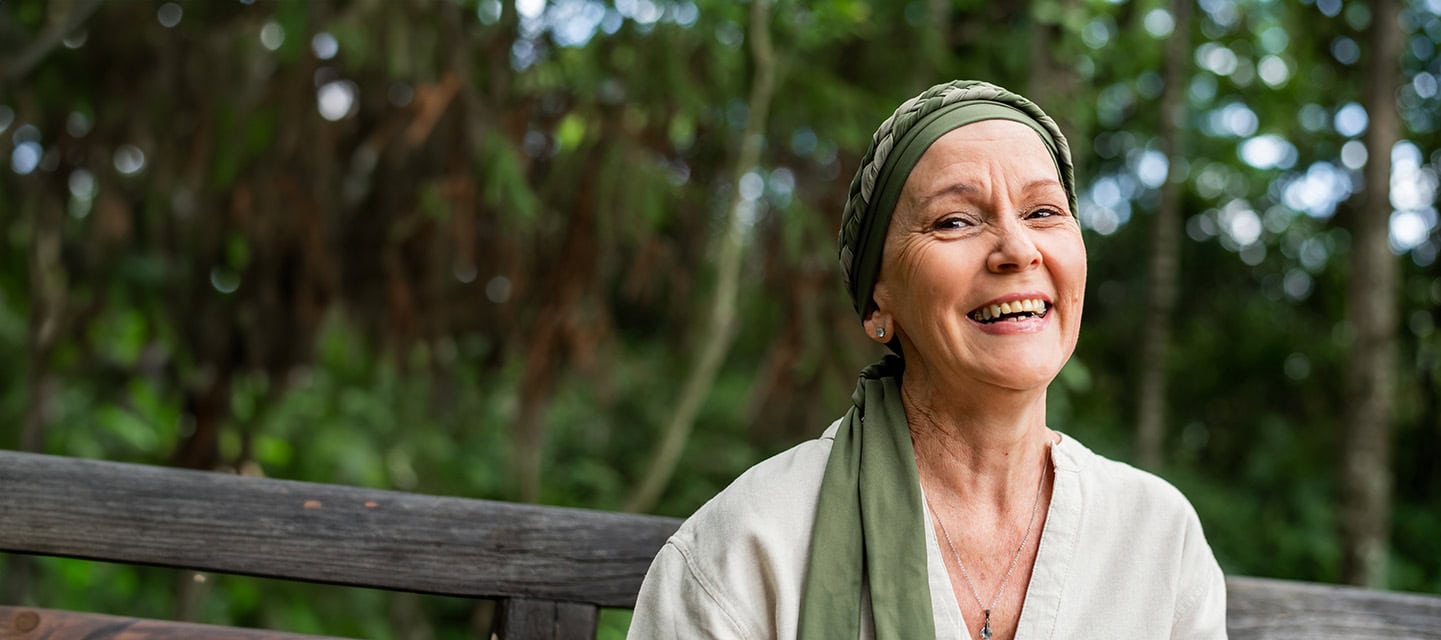 Portrait of a smiling woman wearing a head scarf