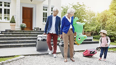 A little girl leaving home to travel with grandparents